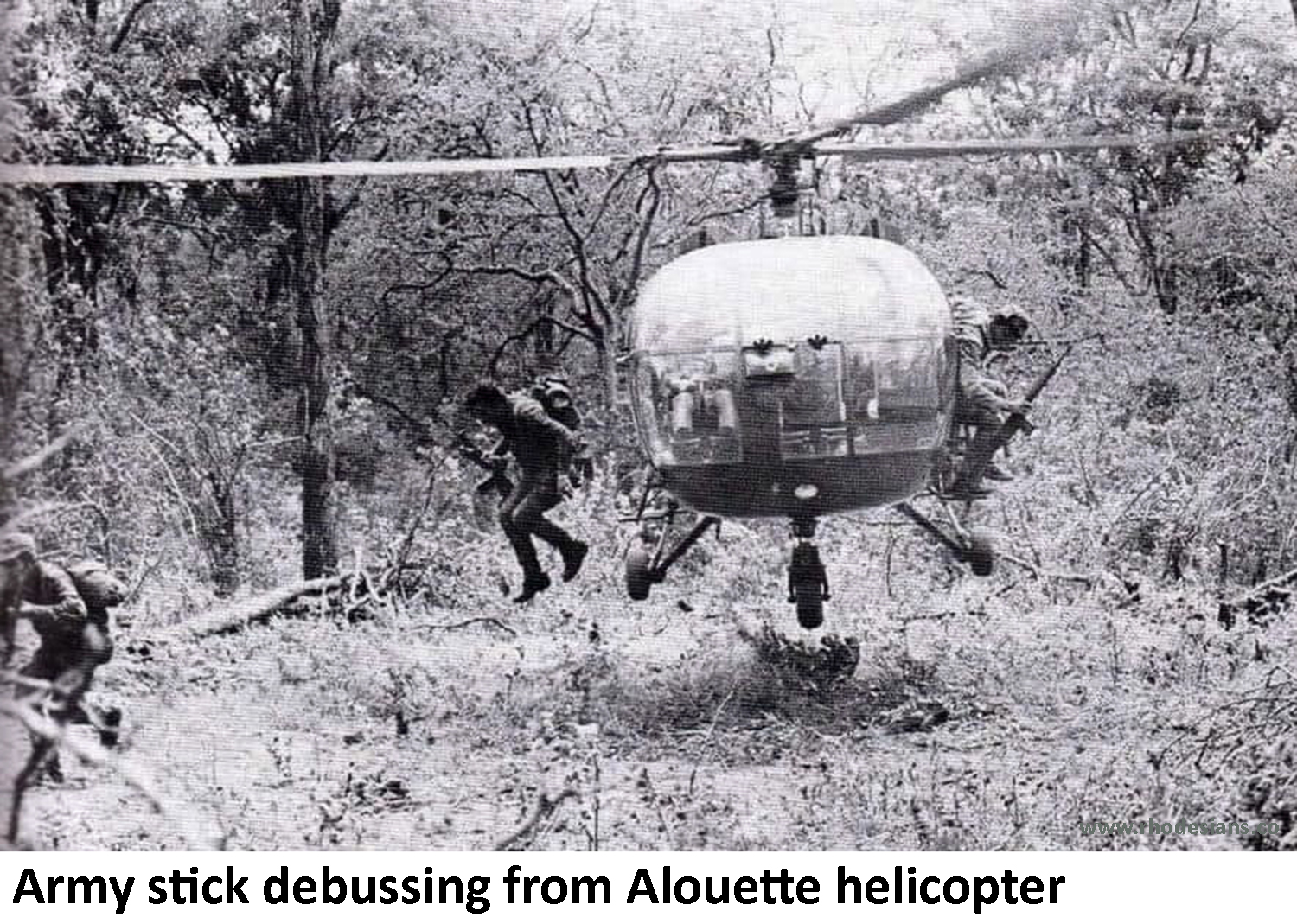 Army stick debusses from Alouette helicopter during Rhodesian Bush War